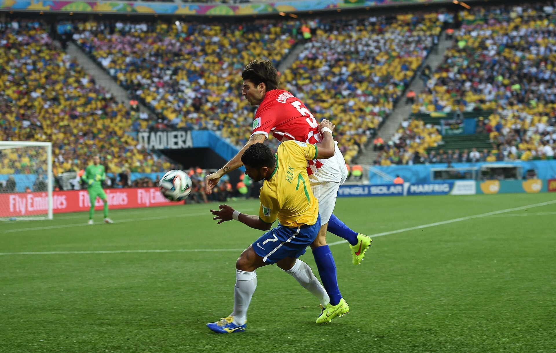 Brazil players in their iconic yellow shirt at the 2014 World Cup